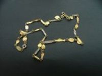 Various links gold chain by Paul Preston - click for more detail